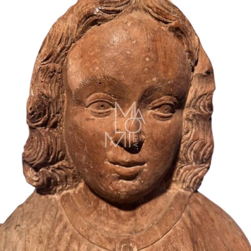 Scopri il capolavoro della scultura lignea lombarda del Quattrocento: l'analisi critica e i dettagli del gruppo scultoreo degli ebanisti bresciani.