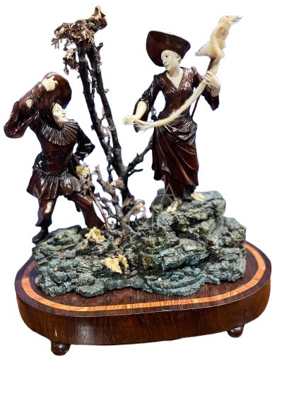 The Walnut and Ivory Sculptural Group by Simon Troger